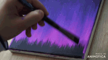 a person is painting a purple sky with a brush on a canvas made in animotica