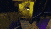 a lamp hanging from a ceiling next to a yellow door