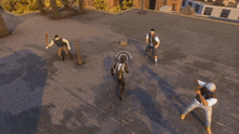 a spider is being attacked by a group of people on a rooftop