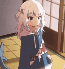 a girl with a shark tail is standing in a room with a window .