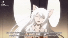 a girl with white hair and cat ears is talking to someone .