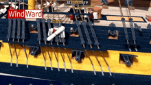 a model of a ship with a wind ward sign
