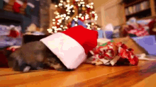 Christmas Puppy GIF - Dog Santa Hat Christmas GIFs