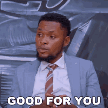 a man in a suit and tie is saying " good for you "