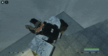 a screenshot of a video game shows a soldier laying on the ground
