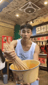 Chinese Guy Dancing With Skewers Meme GIF