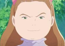 a close up of a girl 's face with a serious expression
