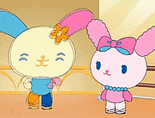 two cartoon rabbits standing next to each other in a room
