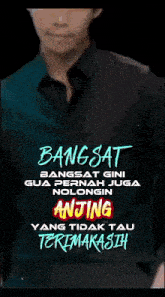a man in a black shirt is standing in front of a fireball that says bangsat bangsat