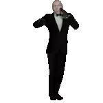 a man in a tuxedo is dancing with his hand up
