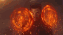 a fireball is being thrown in the air with a dark background