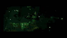 an aerial view of a city at night with smoke coming out of the buildings