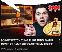 a man is pointing at a screen that says 3 am