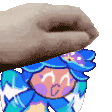 a pixel art of a person holding a cookie over their head