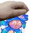 a pixel art of a person holding a cookie over their head
