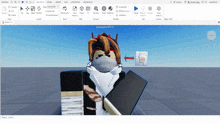 a computer screen shows a person wearing a mask and a crown