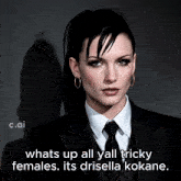 a picture of a woman in a suit and tie with the caption whats up all yall tricky females its drisella kokane