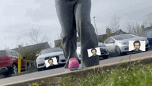 a person standing on a curb with a picture of a man on it