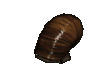 a snail with a brown shell is crawling on a white surface .