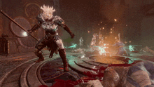 a man with a crown on his head is holding a spear
