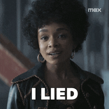a woman in a black jacket with the word i lied behind her