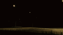 a red and white bus is parked on the side of the road