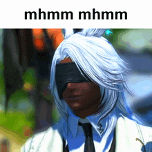 a picture of a man with a blindfold and the words mhmm mhmm