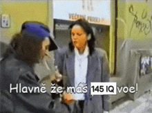 two women are standing next to each other and the words hlavne ze mas 145 iq voe