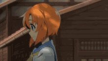 a girl with red hair is wearing a blue and white shirt