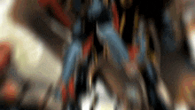 a blurred image of a superhero 's legs and feet