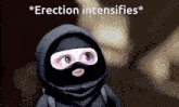 a person wearing a black mask with the words " erection intensifies " written on it
