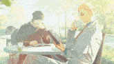 two men sit at a table one reading a book the other drinking a cup of coffee
