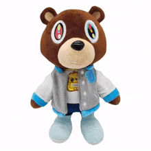 a stuffed teddy bear wearing a jacket and a t-shirt with the letter g on it