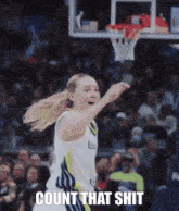 a female basketball player with the words count that shit written below her