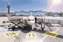 a world of airports sign is on a plane