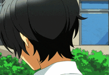 a close up of a person 's head with a window behind them
