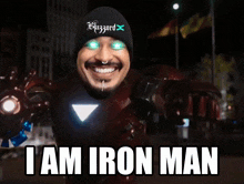 a man in an iron man costume with the words " i am iron man " on the bottom