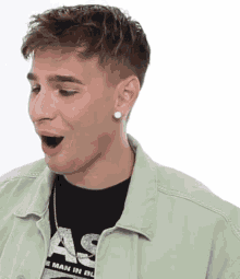 a man wearing a black shirt that says " as " on it