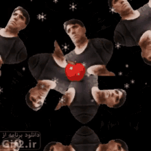 a group of men are standing around a red apple with a gif2.ir logo in the corner