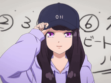 a girl wearing a baseball cap that says on on it