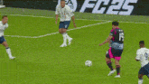 a soccer player wearing a number 19 jersey is jumping in the air