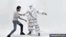 Pillow Fight GIF - Pillow Fight Suit GIFs
