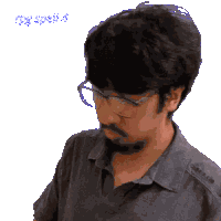 a pixelated image of a man wearing glasses and a beard