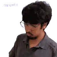 a pixelated image of a man wearing glasses and a beard