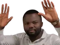 a man with a watch on his wrist is raising his hands in the air