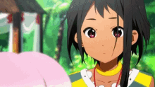 a close up of a girl 's face with red eyes and a yellow shirt .