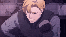 a man with blonde hair is wearing a vest and gloves