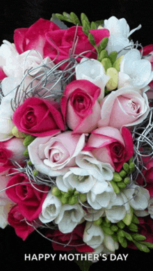 a bouquet of pink and white roses with the words happy mother 's day below them