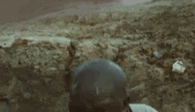 a man is making a funny face with his mouth open and his tongue sticking out .