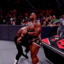 bobby lashley spinebuster big e announce table wwe